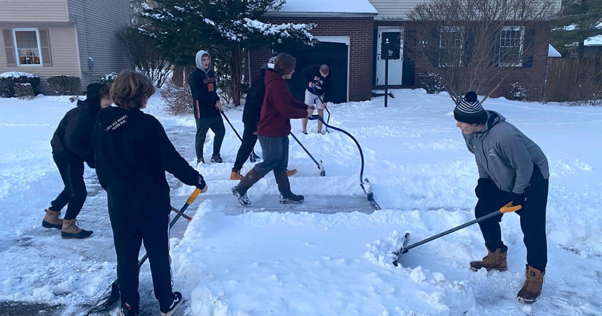 High School Football Team Shovels Snow, Strengthens Community Bonds.jpg