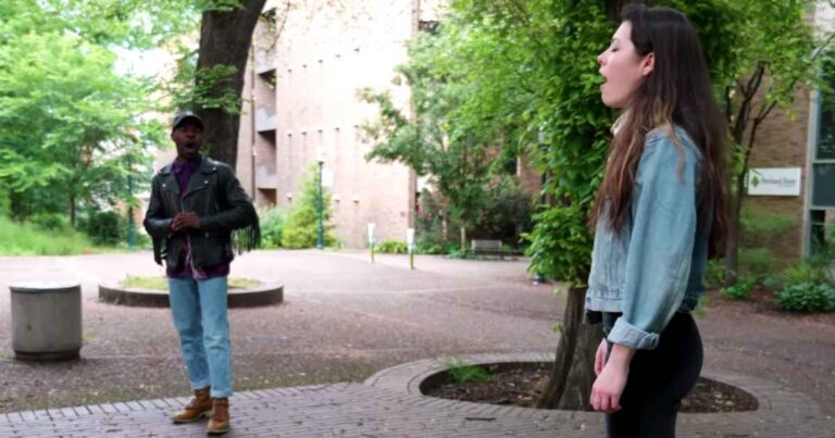 Strangers Unite in Powerful Duet of National Anthem at PSU.jpeg