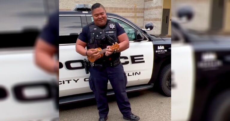 Officer's Ukulele Serenade Humanizes Police During Arrest Moment.jpeg