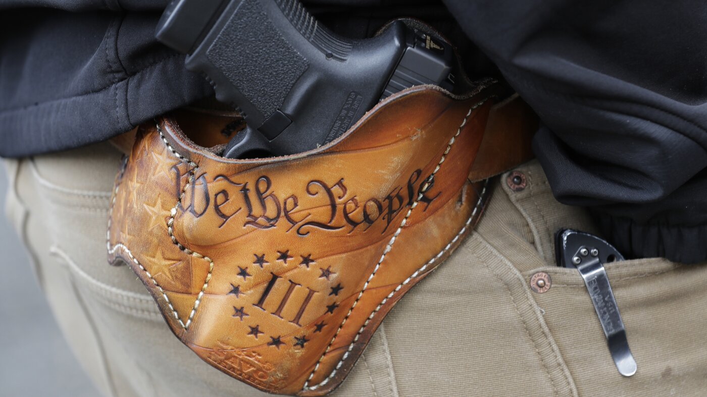 Justice Department restarts program to restore gun rights : NPR