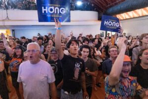 Biden-to-Trump Voters Open to Politicians with Socialist Ideals - New Social Gospel Supporters of Wisconsin Democratic gubernatorial candidate Francesca Hong cheer at her election night party on Tuesday in Madison. Hong, a self-described democratic socialist, narrowly lost the primary.